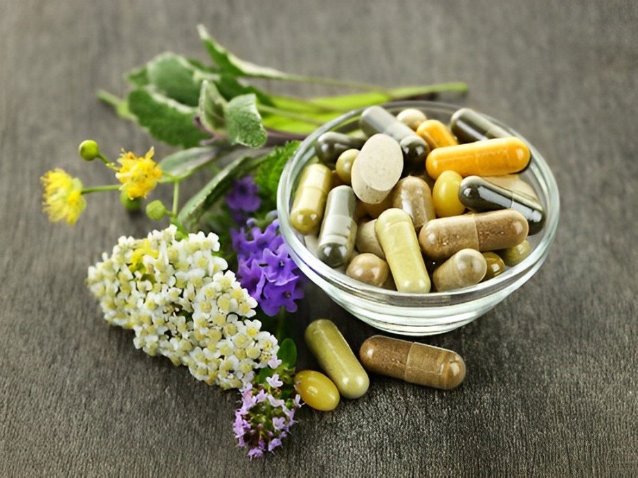 person holding white medication pill